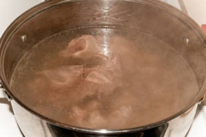 Clean lamb in water.